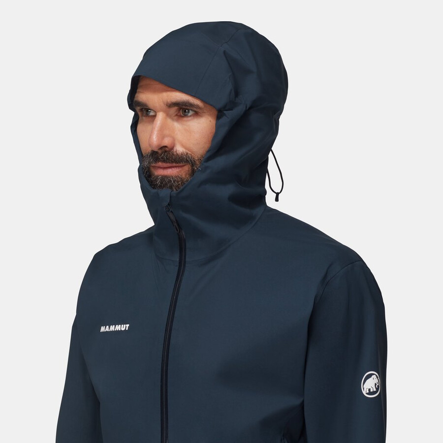 jaqueta com capuz linard guide hs masculina preta e verde-azulado escuro.