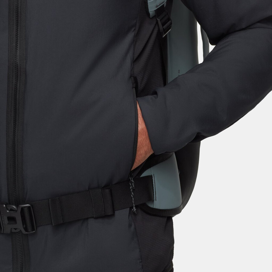 jaqueta com capuz híbrida rime light in para homem cor verde-azulado escuro e preto.