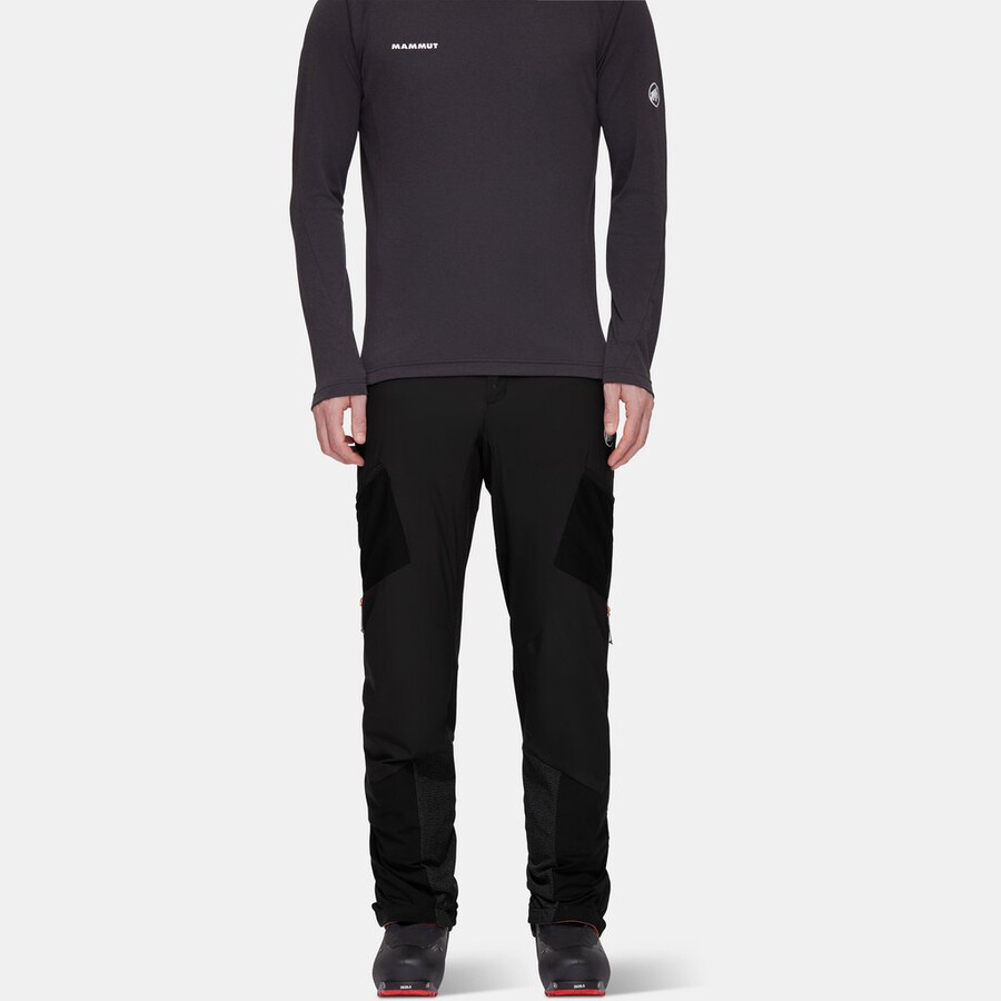 calça híbrida aenergy in para homem preta com laranja vibrante.