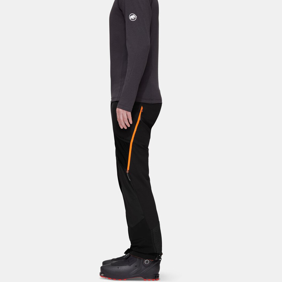 calça híbrida aenergy in para homem preta com laranja vibrante.