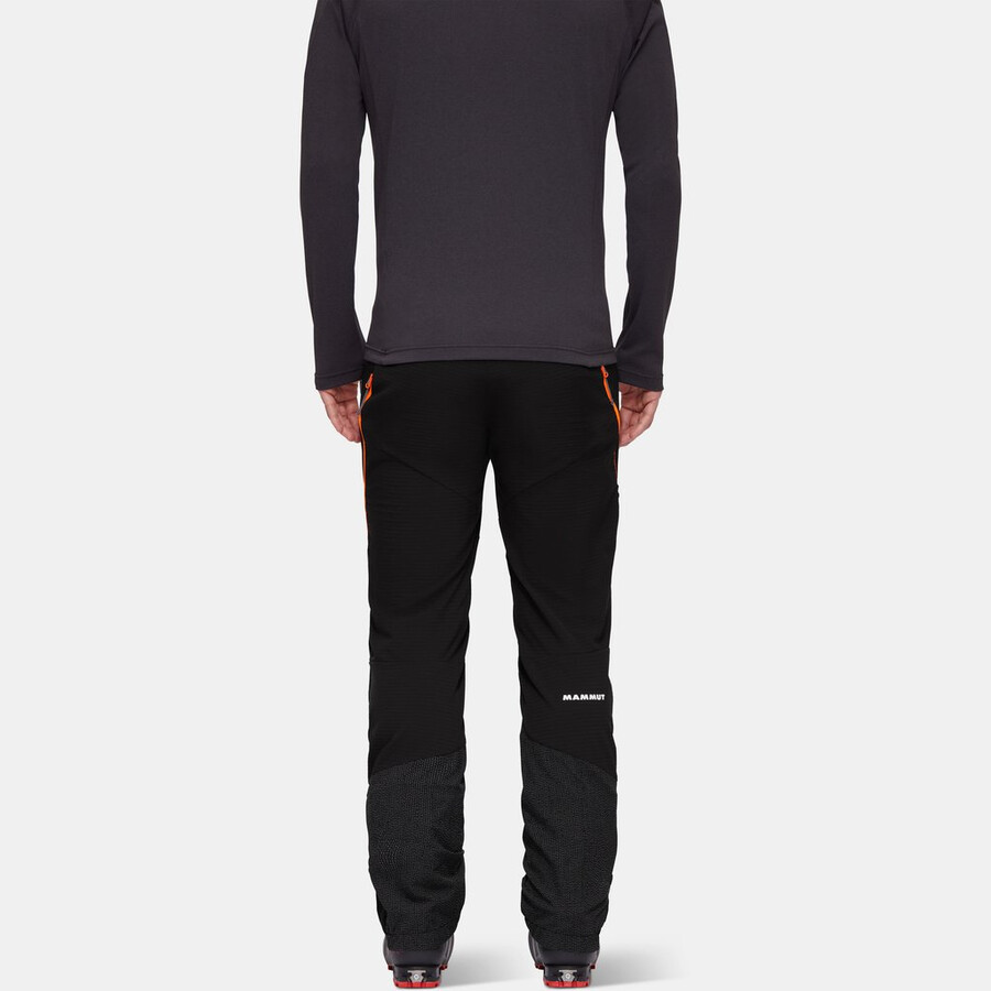 calça híbrida aenergy in para homem preta com laranja vibrante.