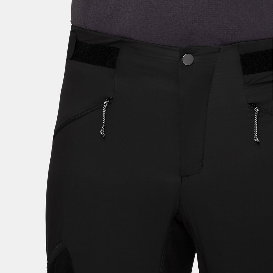 calça híbrida aenergy in para homem preta com laranja vibrante.