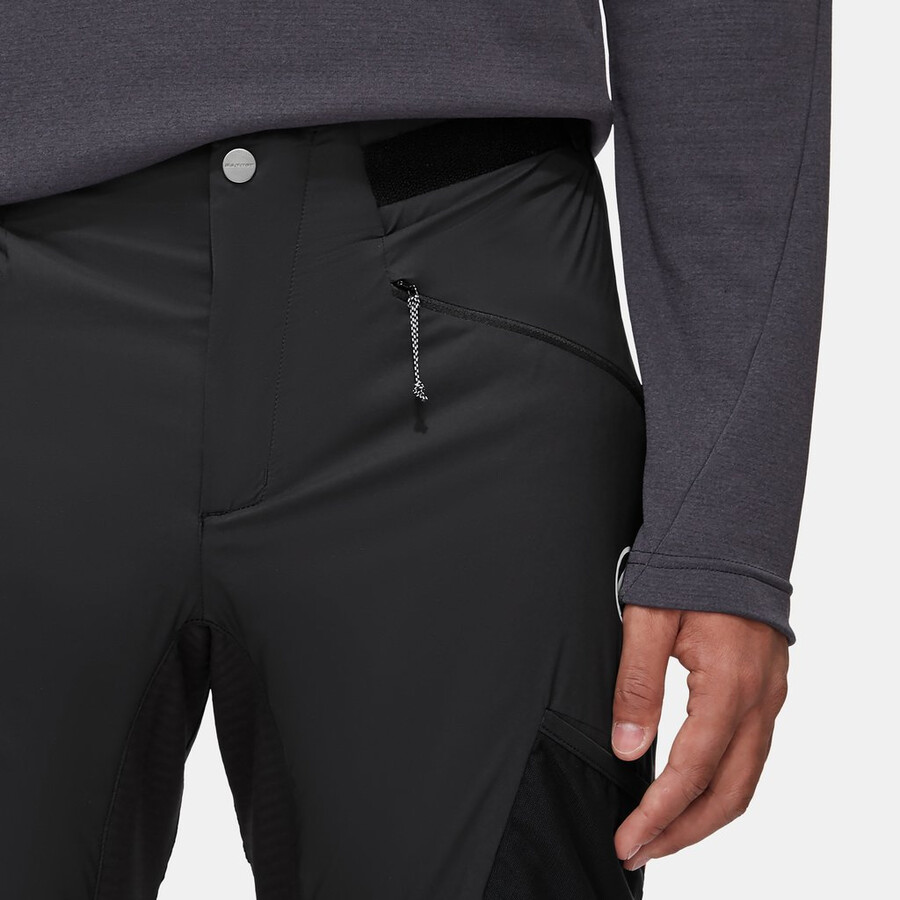calça híbrida aenergy in para homem preta com laranja vibrante.